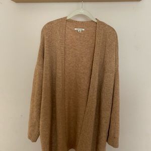 Light pink mid-length cardigan